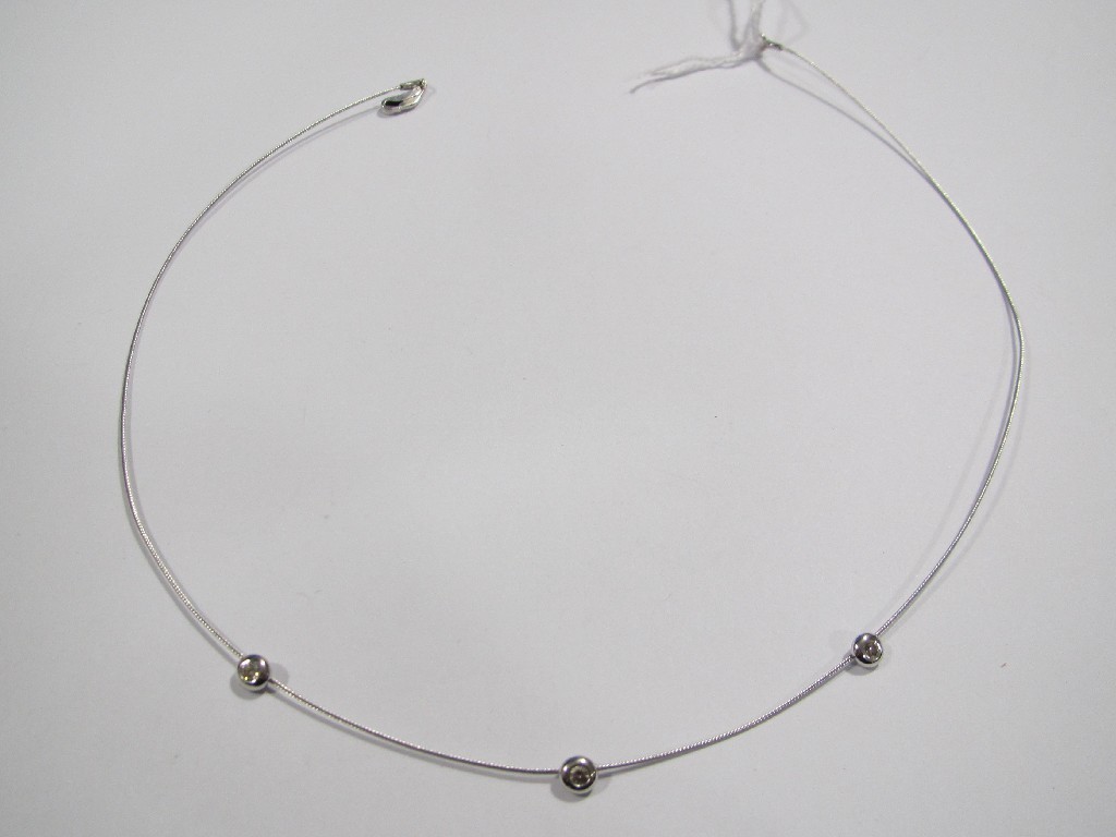 Appraisal: Mappin Webb ct white gold chord choker with three collett