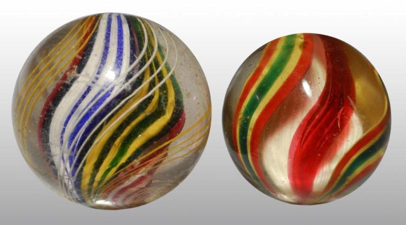 Appraisal: Lot of Swirl Marbles Description One marble has single ribbon