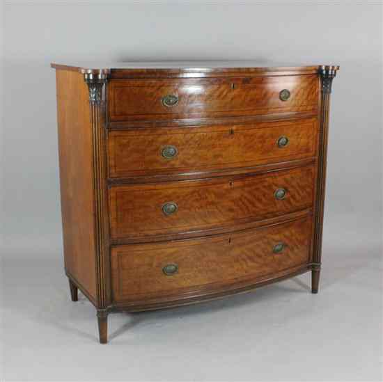 Appraisal: A Regency mahogany bow front chest of four graduated long