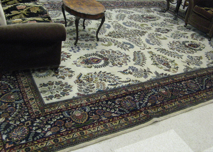 Appraisal: HAND KNOTTED ORIENTAL WOOL CARPET Persian Kashan design overall floral