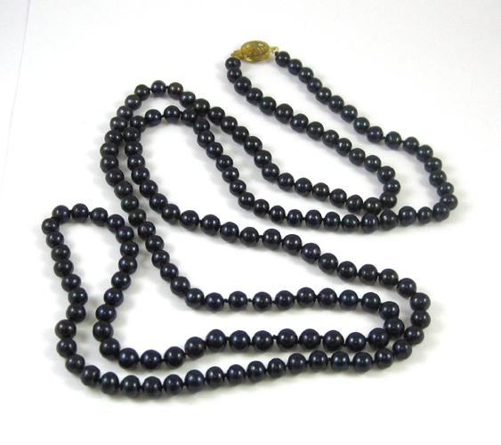 Appraisal: ROPE LENGTH BLACK PEARL NECKLACE measuring - inches in length