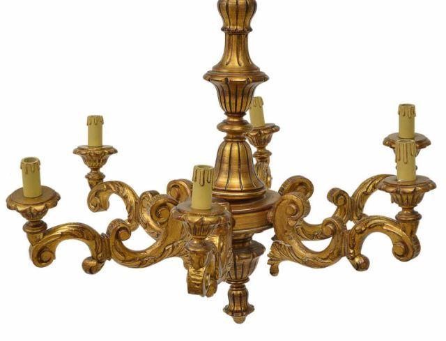 Appraisal: Italian six-light giltwood chandelier th c turned and fluted standard