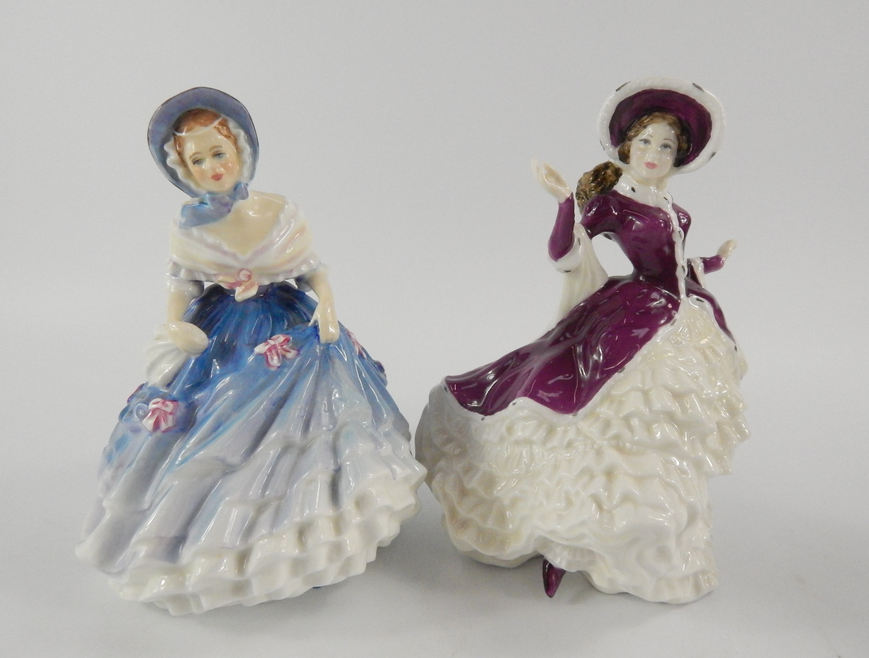 Appraisal: Two Royal Doulton figures of Alice HN and Christmas Day