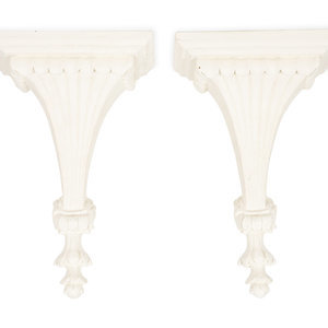 Appraisal: A Pair of Neoclassical Style White Composition Wall Brackets TH