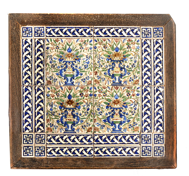 Appraisal: AN ISNIK TILE PANEL mounted in a wooden frame the