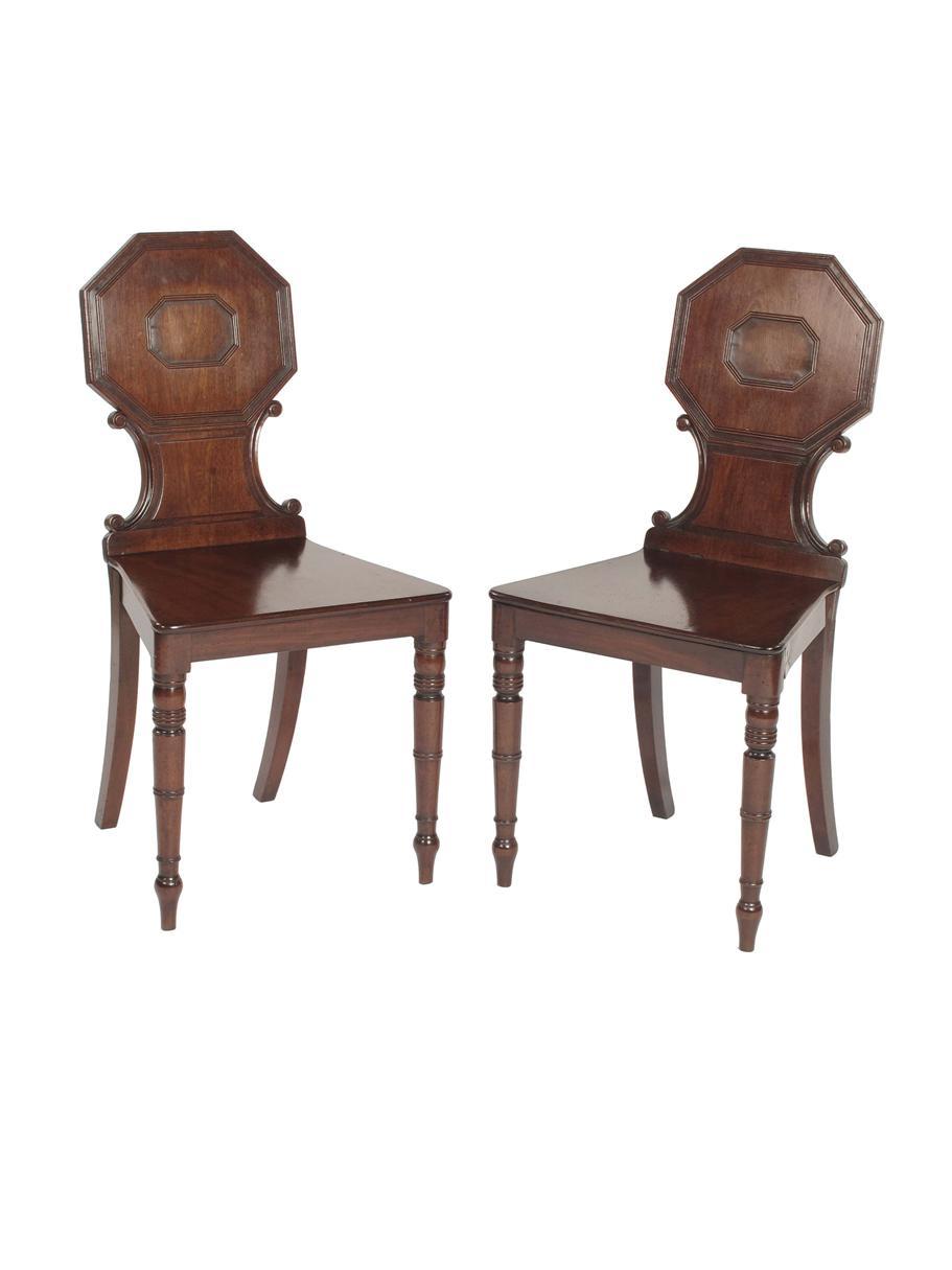 Appraisal: A pair of Regency mahogany hall chairs