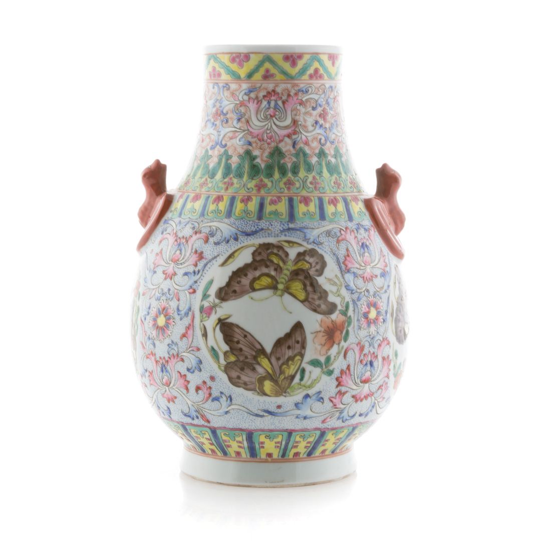 Appraisal: Chinese Famille Rose porcelain vase with bat handles and butterfly