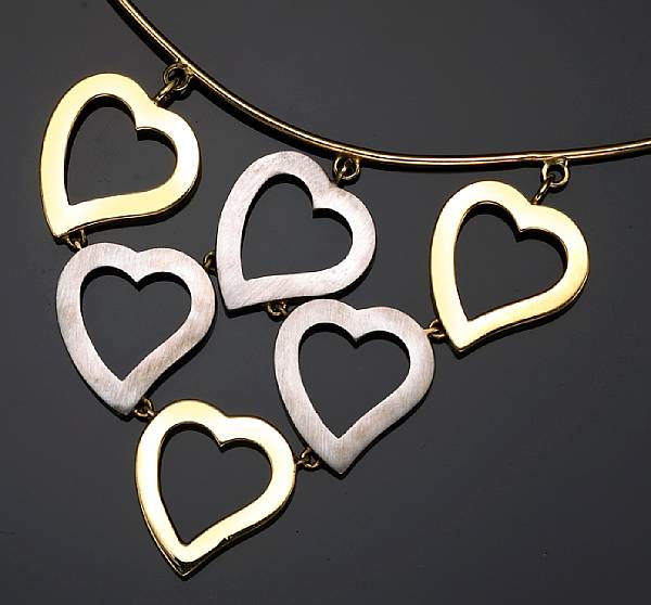 Appraisal: An eighteen karat bicolor gold necklace Italy of heart motif