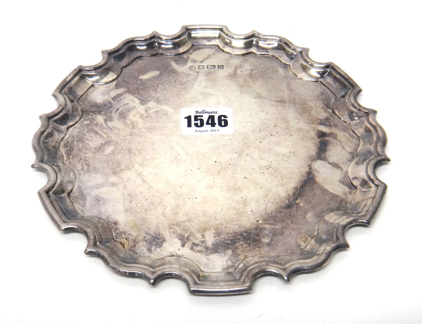 Appraisal: A silver salver of shaped circular form in the Chippendale