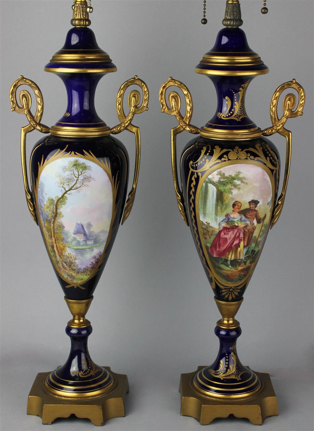 Appraisal: TWO SEVRES STYLE BLUE GROUND TABLE LAMPS of tapering baluster