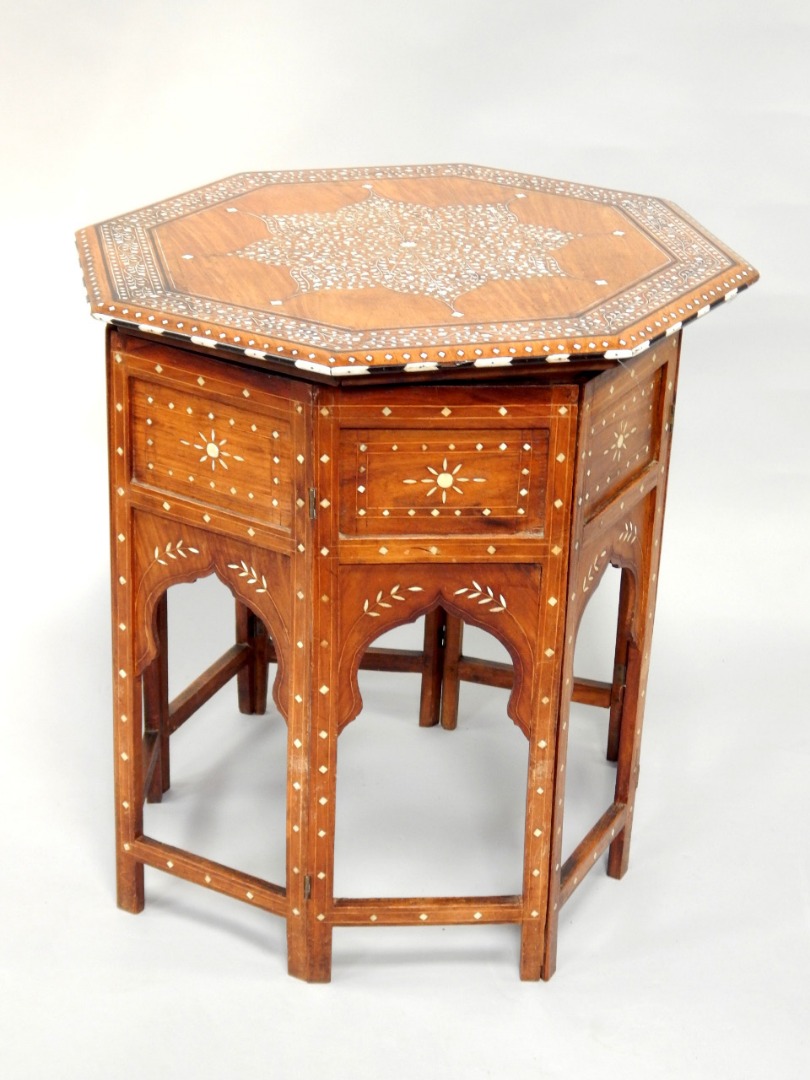 Appraisal: A Indian inlaid hardwood octagonal occasional table with an inlaid