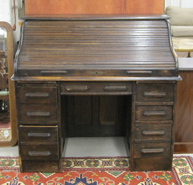 Appraisal: DARK OAK ROLL-TOP DESK American c an S-roll double pedestal