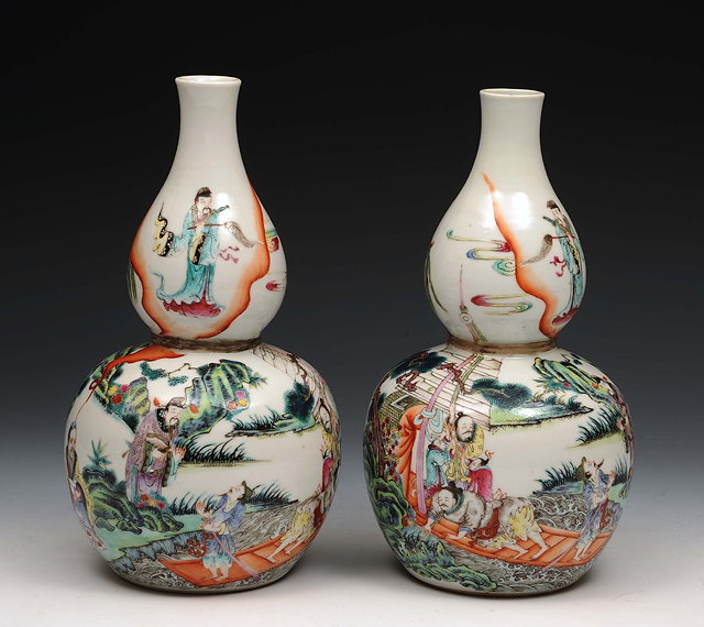 Appraisal: A Pair of Chinese famille rose vases th Centurydecorated with