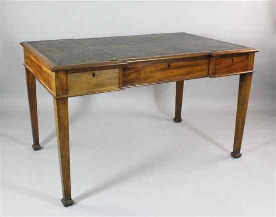 Appraisal: An Edwardian inverted breakfront mahogany partner's desk by Heals of