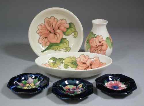 Appraisal: A Moorcroft pottery hexagonal ashtray painted with ''Hibiscus'' pattern on