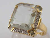 Appraisal: A yellow metal tests carat gold ring quartz and diamond