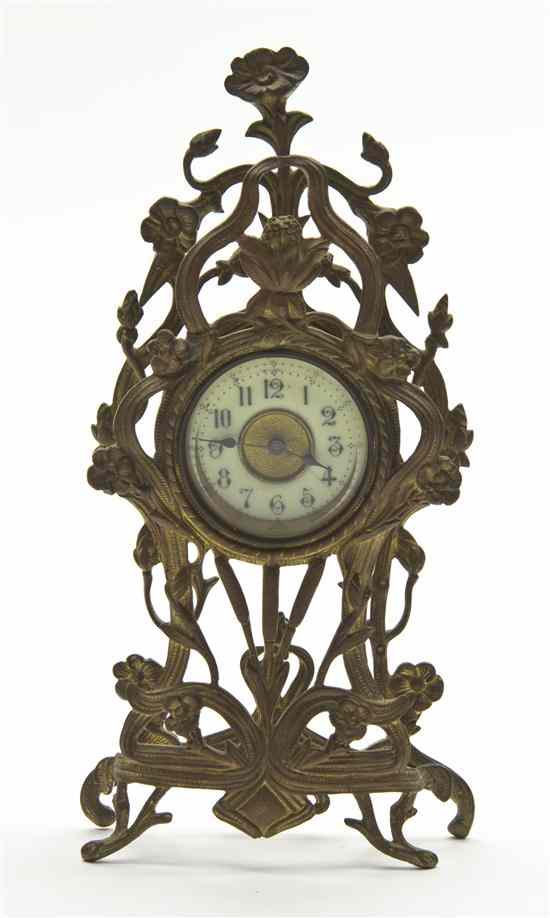 Appraisal: An Art Nouveau Brass Desk Clock having a circular dial