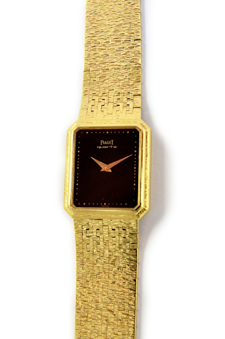 Appraisal: A lady's ct gold Piaget quartz rear winding rectangular cased