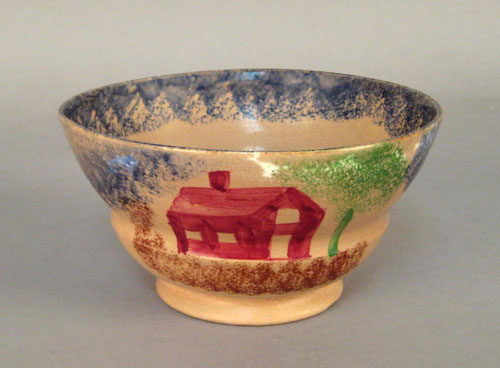 Appraisal: Blue spatter bowl th c with a schoolhouse h dia