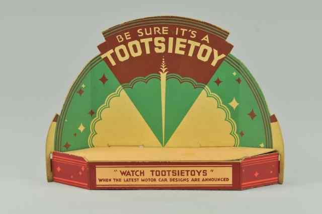 Appraisal: TOOTSIETOY COUNTER STORE DISPLAY Colorful pressboard display with built out