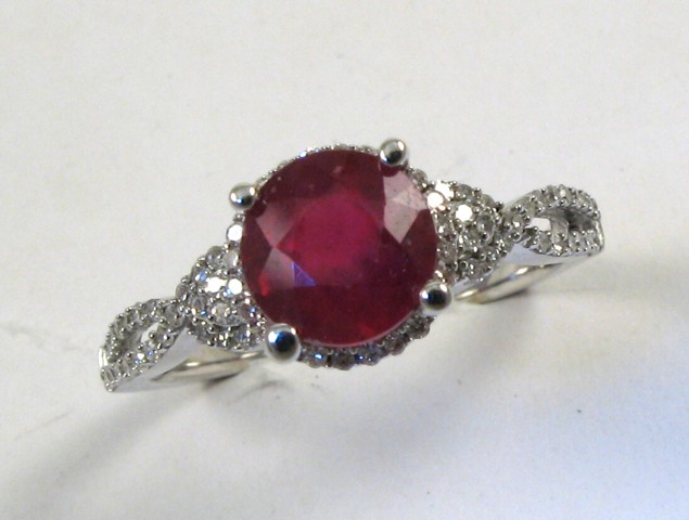 Appraisal: RUBY DIAMOND AND FOURTEEN KARAT GOLD RING with appraisal The