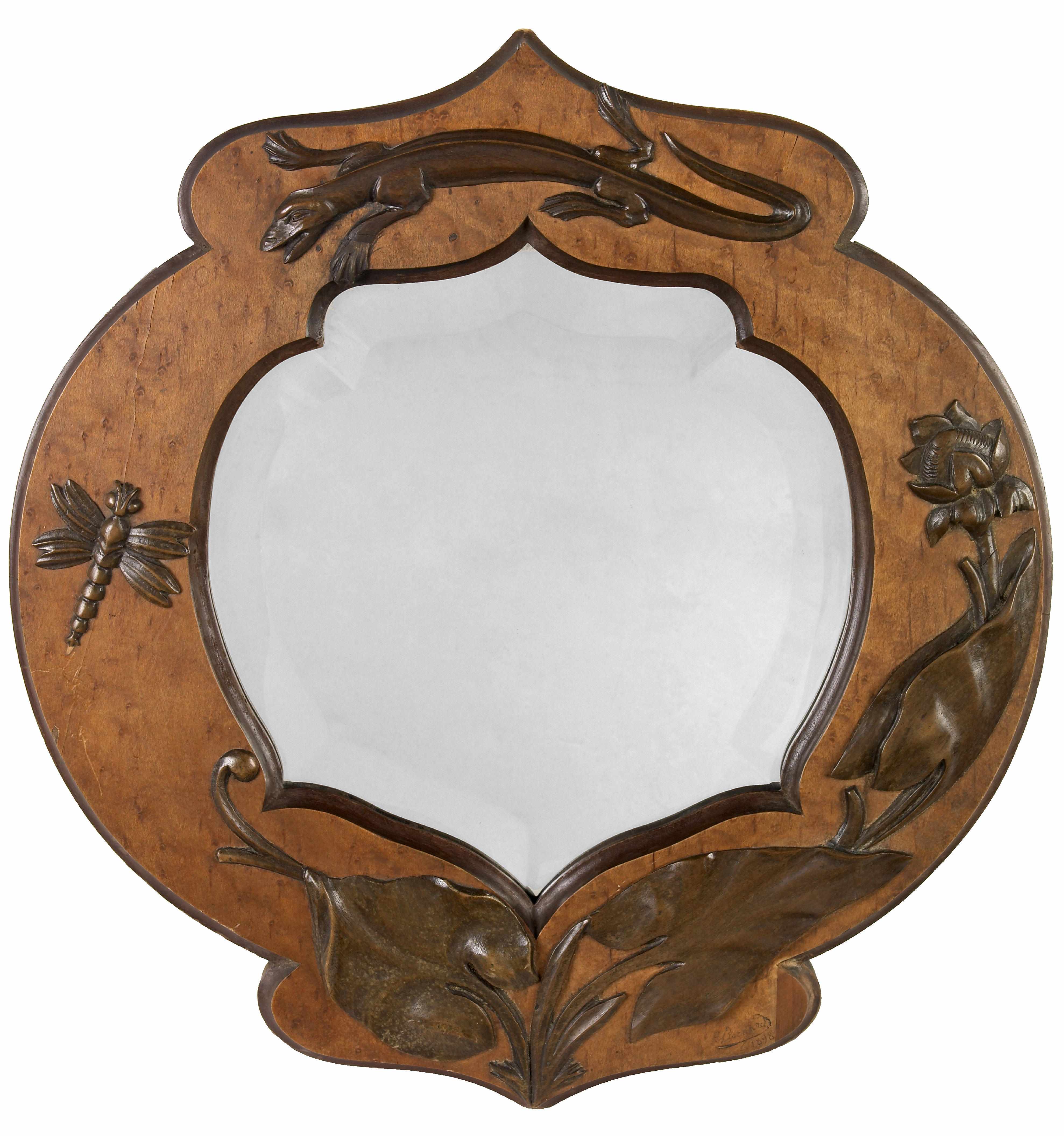 Appraisal: An Art Nouveau carved wood mirror circa signed indistinctly and