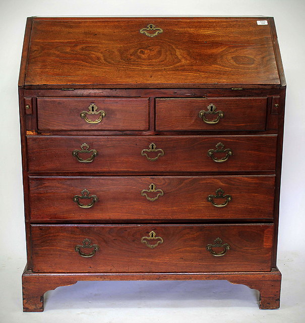 Appraisal: A TH CENTURY MAHOGANY BUREAU the fall front enclosing a