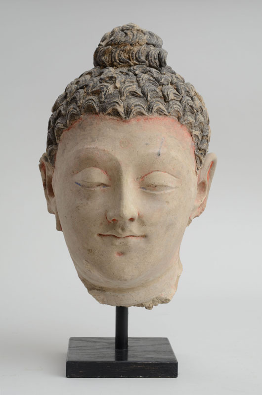 Appraisal: GANDHARAN POLYCHROME CLAY HEAD OF BUDDHA Possibly th- th century