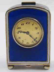 Appraisal: A Swiss hallmarked and enamelled miniature travelling clock by Juvenia