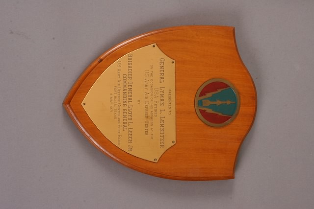 Appraisal: Medal on wood presentation plaque presented to Gen Lyman L