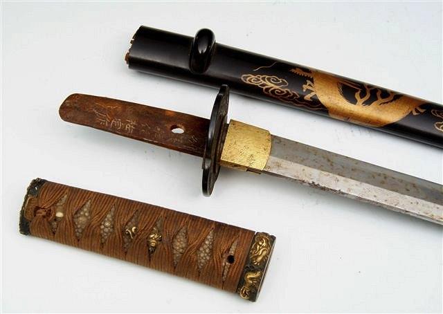 Appraisal: A JAPANESE TANTO with kodzuka in a lacquered scabbard the