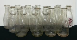 Appraisal: Dairy- clear quart bottles Akron O - including 'Akron Pure