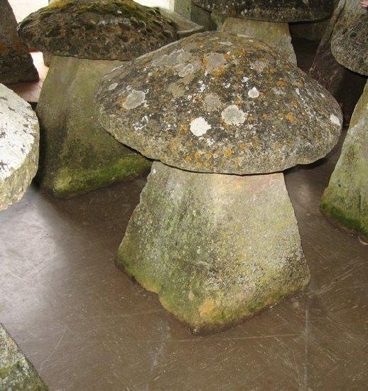 Appraisal: Two th Century Cotswold stone staddle stones with square tapering