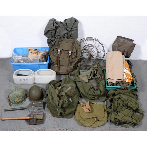 Appraisal: Various helmets rucksacks spades etc used by the late owner