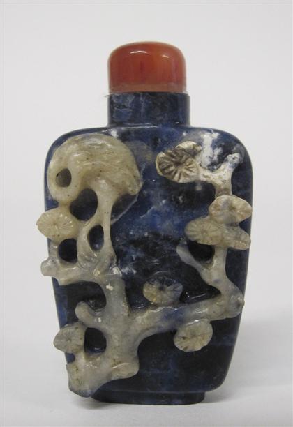 Appraisal: Chinese carved sodalite snuff bottleDomed quartz stopper over square baluster