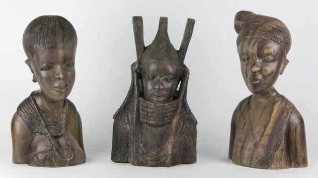 Appraisal: Three Nigerian carved hardwood busts of tribal figures