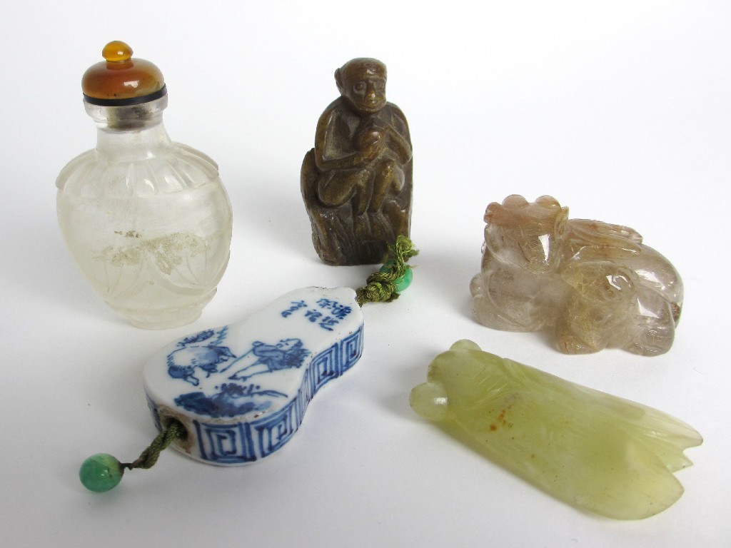 Appraisal: A Chinese rock crystal snuff bottle cicada ram bottle blue