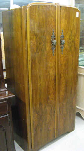 Appraisal: PETITE BURL WALNUT WARDROBE Harris Lebus Furniture Co English after