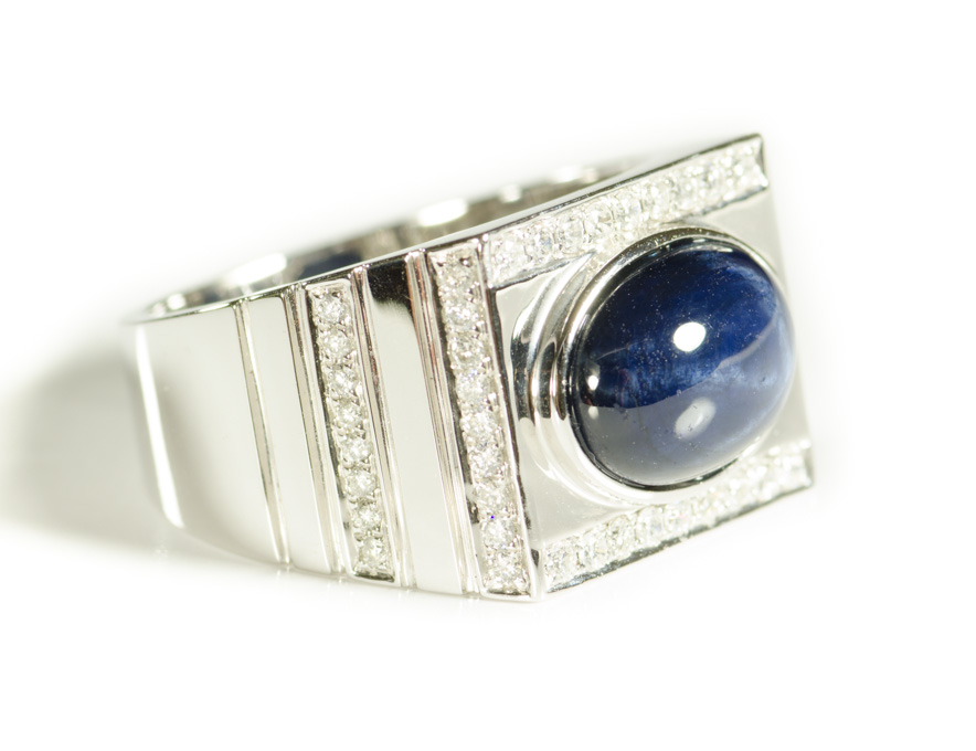 Appraisal: MAN'S STAR SAPPHIRE AND DIAMOND RING k white gold with