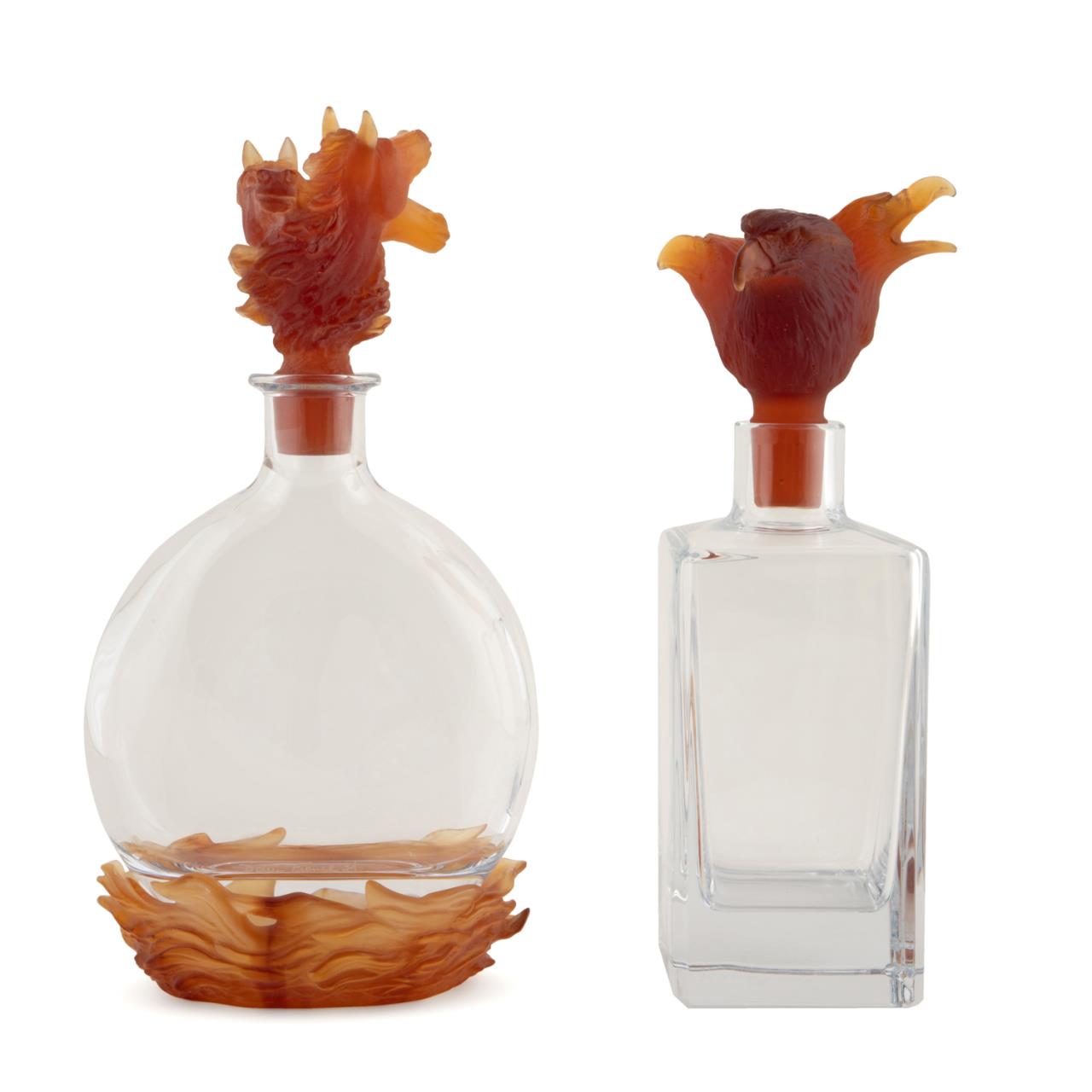 Appraisal: TWO DAUM AMBER PATE-DE-VERRE DECANTERS Two numbered Daum crystal decanters