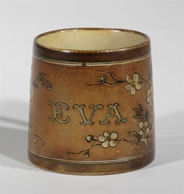 Appraisal: Eva' a Martin Brothers stoneware mug incised with sprays of