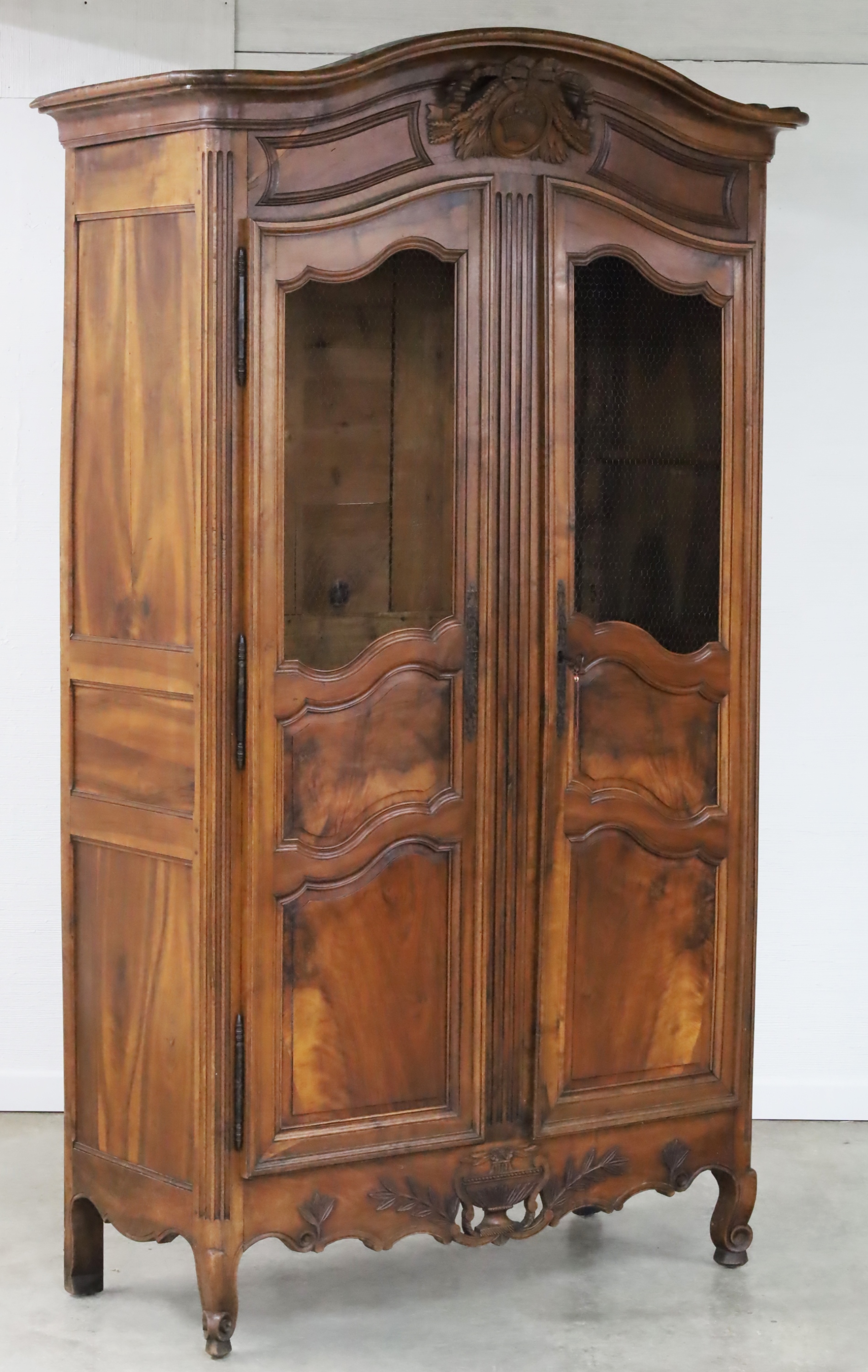 Appraisal: LOUIS XV STYLE CARVED WALNUT ARMOIRE W MESH DOORS French