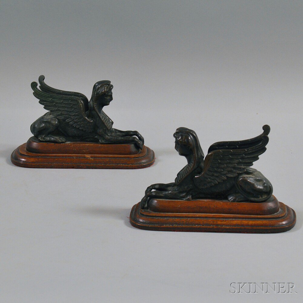 Appraisal: Pair of Victorian Bronze Sphinxes on Walnut Bases late th