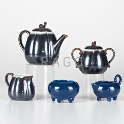 Appraisal: ROOKWOOD Five pieces Nubian Black teapot creamer sugar set creamer