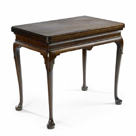 Appraisal: A mahogany foldover games table In the mid th century