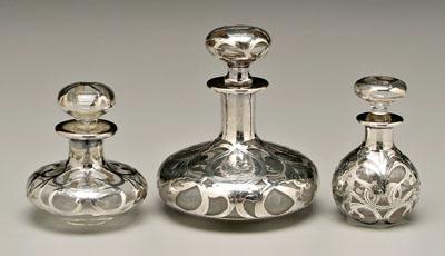 Appraisal: Three silver overlay perfumes all clear glass largest with three-initial