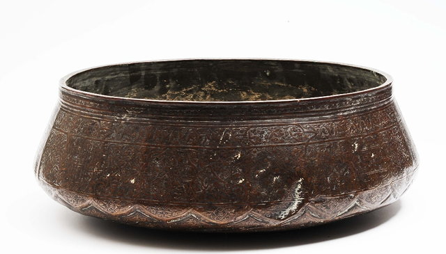 Appraisal: A Persian Mamluk brass engraved bowl th Centuryengraved with arabeques