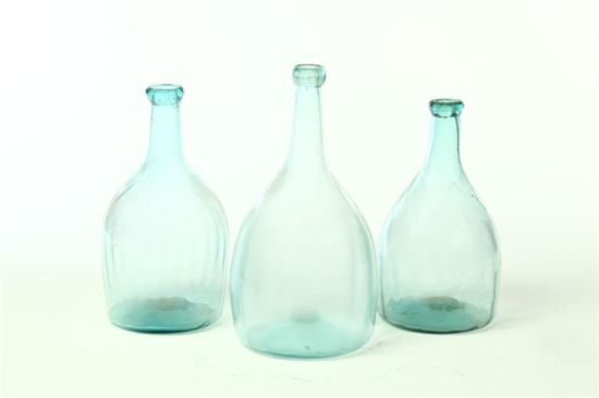 Appraisal: THREE AQUA BOTTLES American nd quarter- th century blown glass