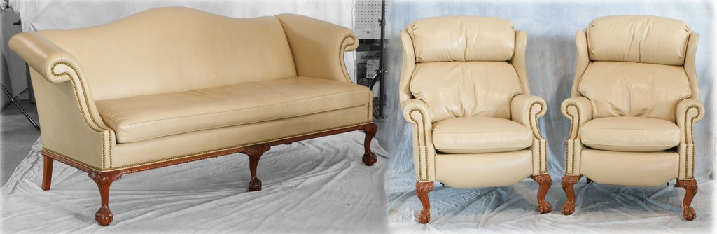 Appraisal: Tan leather upholstered Chippendale style sofa with recliners by Hancock