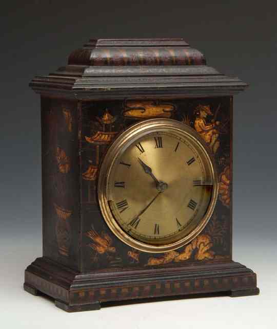 Appraisal: AN EDWARDIAN BLACK LACQUER MANTEL TIMEPIECE the case decorated with